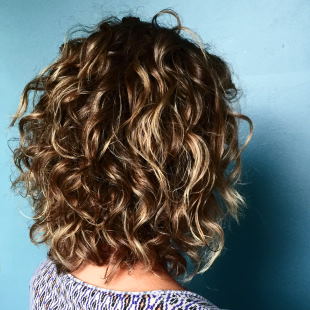 shoulder-length curly hair